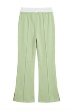 Pantalone con dettaglio in vita a contrasto