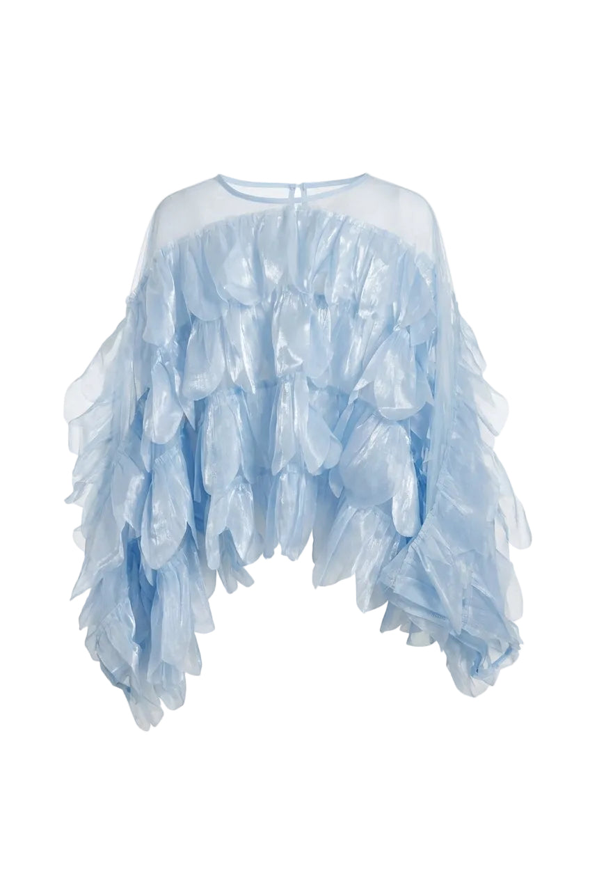 Blusa azzurra in organza con balze scenografiche