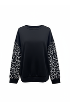 ANIMAL PRINT SLEEVE SWEATSHIRT