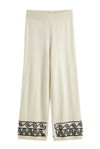 Trousers with embroidery