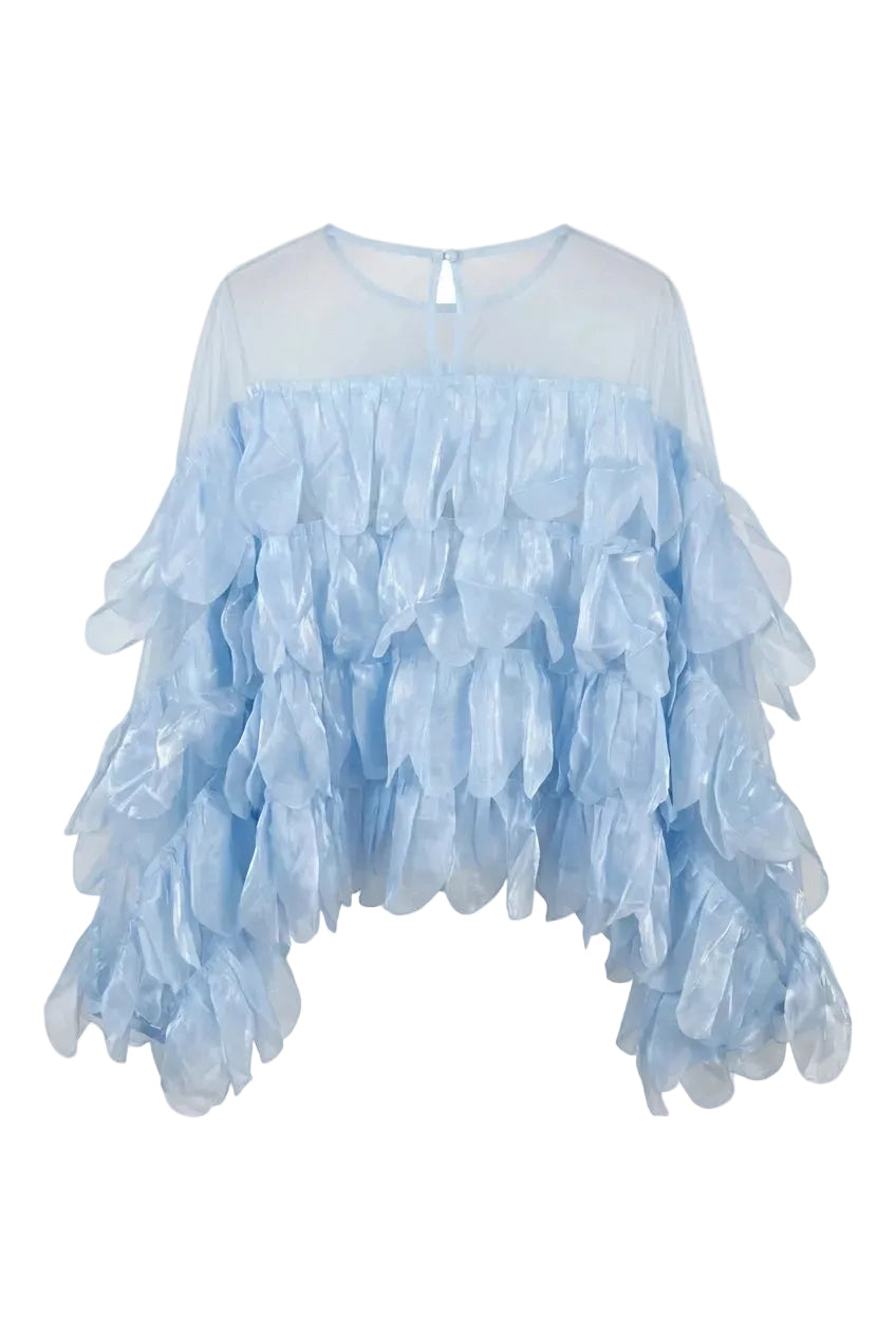 Blusa azzurra in organza con balze scenografiche